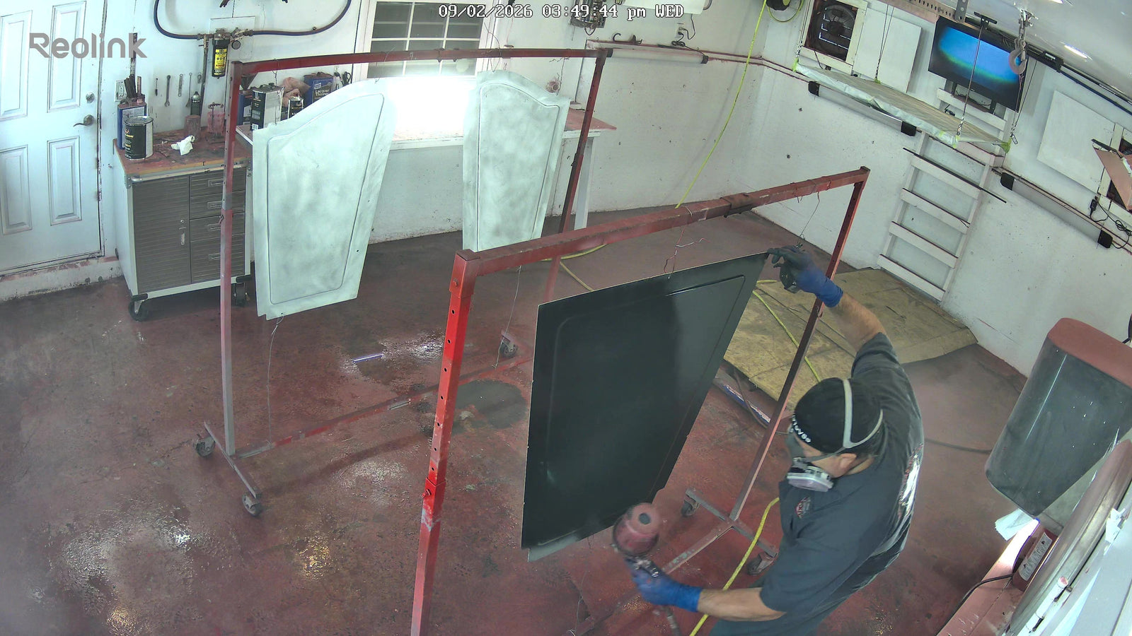 Bare aluminum automotive panel being prepared for epoxy primer and paint